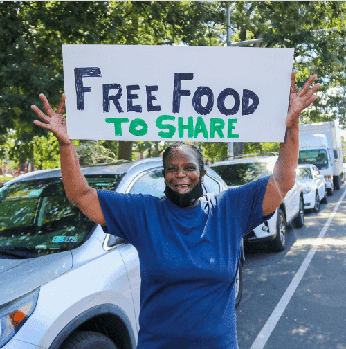 person holding a sign