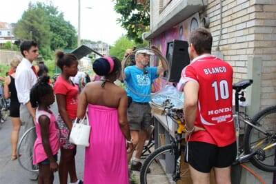 people standing in front of a bike shope