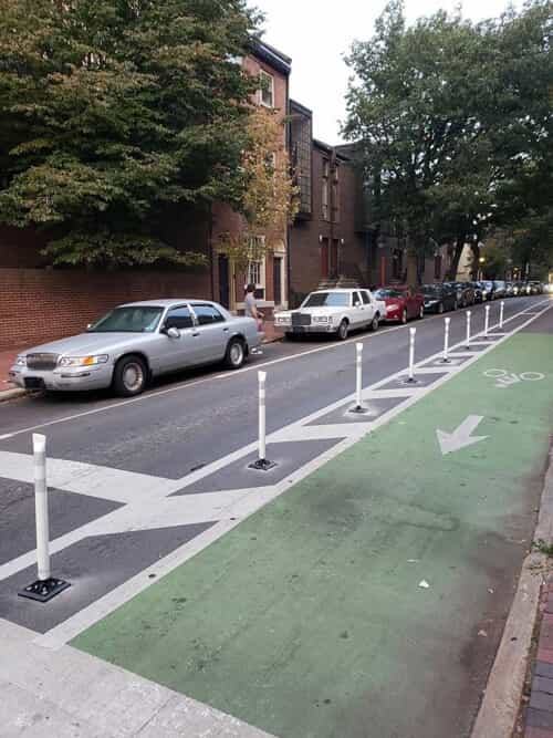 lane delineators along Spruce and Pine streets’ newly paved bike lanes