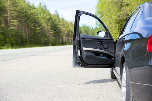 parked car with open door